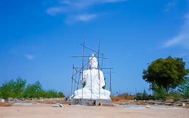 Serene Buddha statue at USM Infra Go Valley, Salvapur, Hyderabad, creating a peaceful ambiance