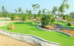 Enjoy a round of mini golf at USM Infra Go Ranch. Perfect for families and visitors, this recreational activity offers fun and relaxation amidst the beautiful surroundings of the resort near Hyderabad.