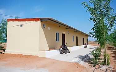 Comfortable staff quarters at USM Infra Go Valley, Salvapur, Hyderabad, providing a well-equipped living space