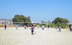 Enjoy a thrilling game of beach volleyball at USM Infra Go Ranch. A perfect recreational activity for guests, combining fun and fitness at this top-notch resort near Hyderabad.